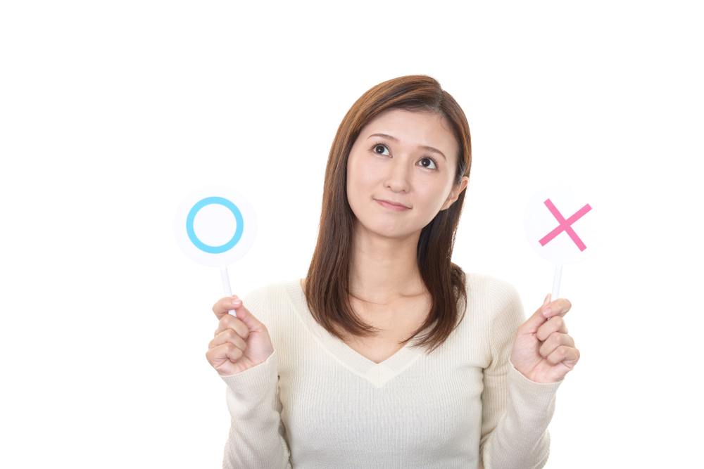 ○×を持っている女性